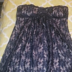 Tan dress covered in beautiful black lace